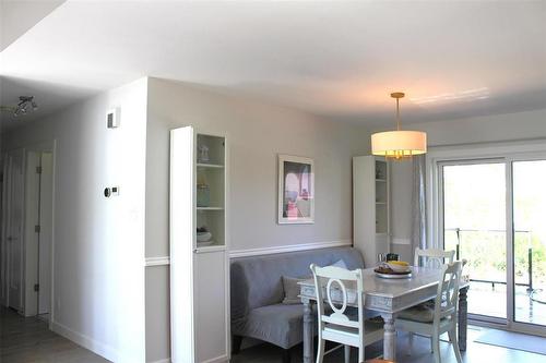 The dining room has room to accommodate a large table and buffet hutch/china cabinet. - 7 Dalvik Road, Gimli Rm, MB 