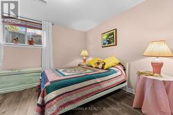 2nd bedroom in the lower level - large windows - 