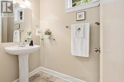 2 piece powder room by front entry. - 
