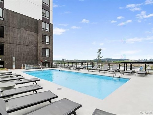 Pool - 230-7227 Boul. Newman, Montréal (Lasalle), QC - Outdoor With In Ground Pool