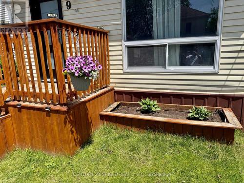 Front verandah & flower garden - 9 Bergin Avenue, Cornwall, ON 
