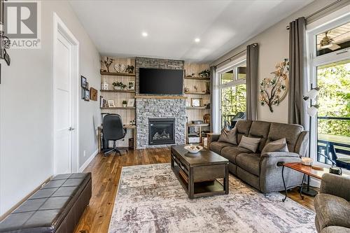 25 Carla'S Lane, Blind River, ON - Indoor Photo Showing Living Room With Fireplace