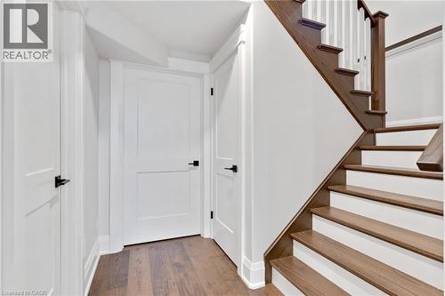 Hardwood staircase with painted risers and balusters - 12 George Street, Waterloo, ON 
