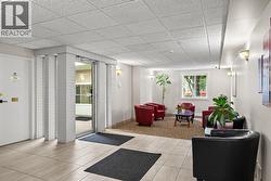 Main entrance of the building-well kept and pride of ownership throughout the strata & amenities. - 
