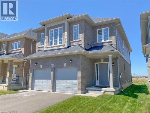 Contemporary two-story residence featuring a brick and siding exterior - 287 Rockledge Drive, Hamilton, ON 