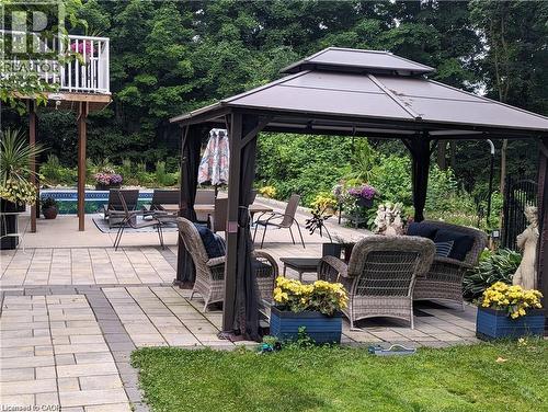 Expansive paver patio with a gazebo, offering dedicated outdoor living spaces - 355 Edgehill Drive, Kitchener, ON 