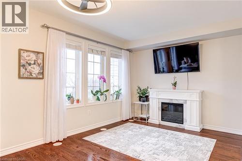 7 Sirente Drive Unit# 11, Hamilton, ON - Indoor Photo Showing Living Room With Fireplace