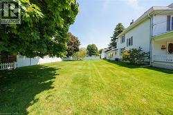 Separate, vacant lot next door included in purchase price - 