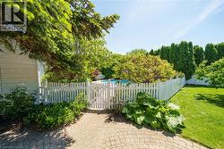 Gate to pool area and summer kitchen - 