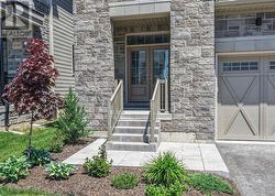 Tastefully landscaped, covered front porch - 