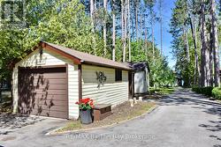 Front Garage with Man Door - 