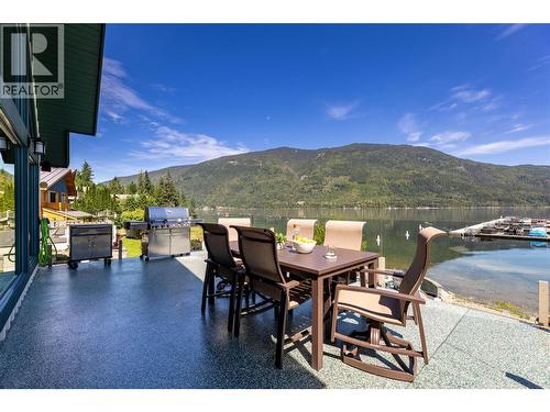 outdoor entertaining made easy with a large deck new railings and apoxy  deck in 2015 - 6421 Eagle Bay Road Unit# 13, Eagle Bay, BC 