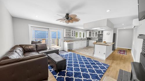 12811 3A Highway, Boswell, BC - Indoor Photo Showing Living Room With Fireplace