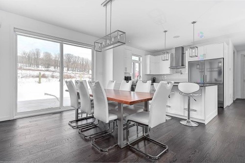 Salle à manger - 6020 Rue Robert, Saint-Placide, QC - Indoor Photo Showing Dining Room