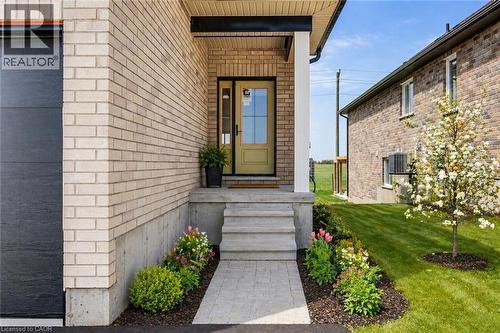 AI FINISHED ENTRANCE - 114 Bedell Drive, Mapleton, ON - Outdoor With Exterior