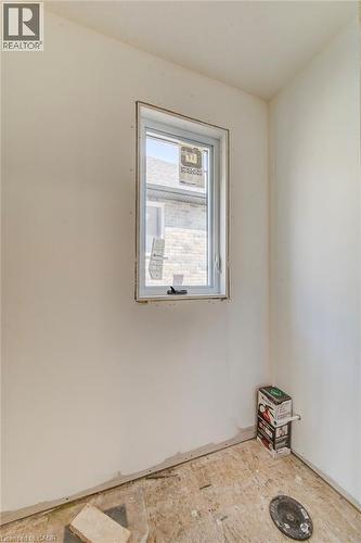 2 pc bathroom - 114 Bedell Drive, Mapleton, ON - Indoor Photo Showing Other Room