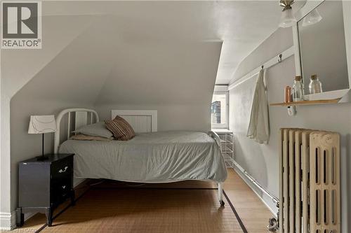 Sloped ceilings with light neutral paint throughout - 111 Spadina Avenue, Hamilton, ON 