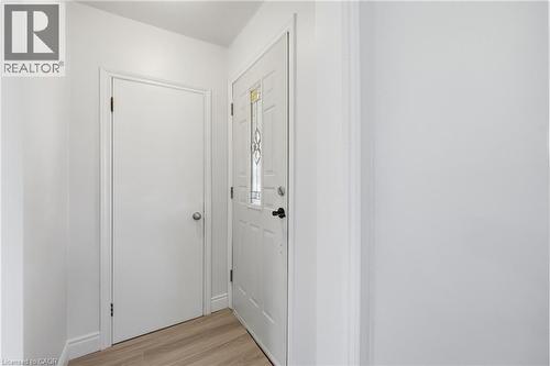 Entryway featuring wood-finish flooring - 97 Tragina Avenue S, Hamilton, ON 