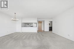 Open-concept dining and living area. - 