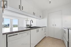 Ample cabinetry in the kitchen. - 