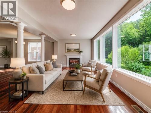 Virtually staged living room. - 712 Brookmill Place, Waterloo, ON 