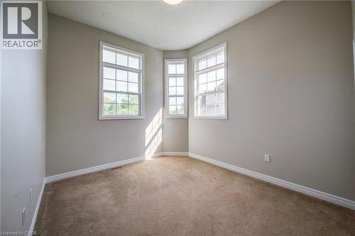 One of 5 upper bedrooms, this with high ceilings for added light. - 712 Brookmill Place, Waterloo, ON 