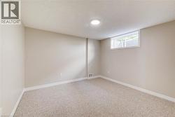 One of two bedrooms in lowest level. - 