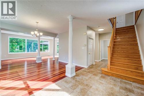 Warm finishes, freshly painted. Updated lighting. - 712 Brookmill Place, Waterloo, ON 