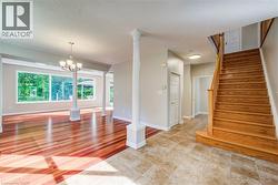 Warm finishes, freshly painted. Updated lighting. - 