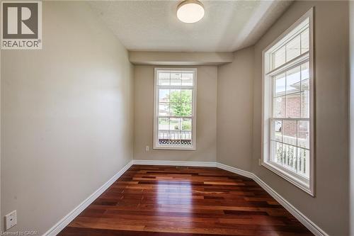 Brazilian cherry hardwood is amazing. - 712 Brookmill Place, Waterloo, ON 