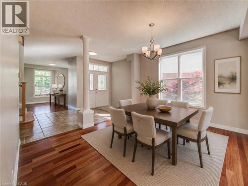 Virtually staged dining area. - 712 Brookmill Place, Waterloo, ON 