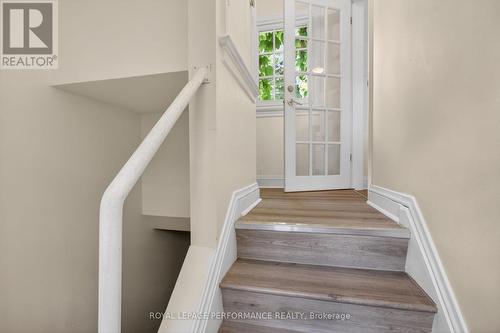 Stairs to side door and lower level - 18 Harvard Avenue, Ottawa, ON 