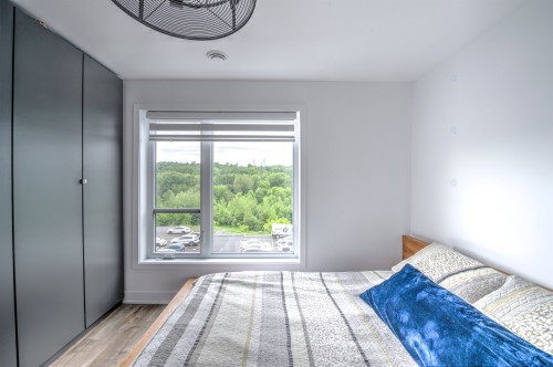 Chambre à coucher - 404-10065 Rue De L'Épervier, Mirabel, QC 