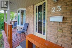 Brick exterior with an inviting covered porch - 