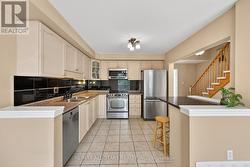 Kitchen with stainless steel appliances - 