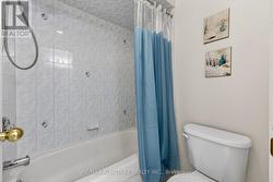 Upper level bath toilet & tub w/door for privacy - 