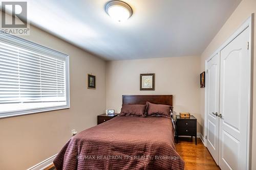 Second Bedroom with Double Closet & Hardwood Floor - 25 Leafield Drive, Toronto, ON 