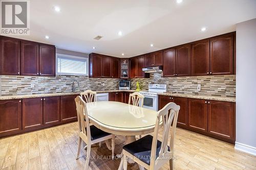 Backsplash and B/I Appliances - 25 Leafield Drive, Toronto, ON 