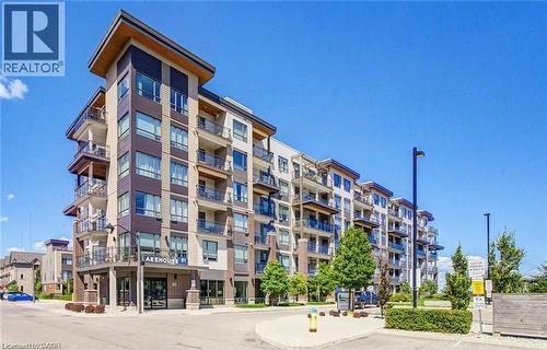 Multi-story residential building featuring a modern facade with balconies - 40 Esplanade Lane Unit# 614, Grimsby, ON 