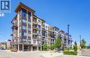Multi-story residential building featuring a modern facade with balconies - 40 Esplanade Lane Unit# 614, Grimsby, ON 
