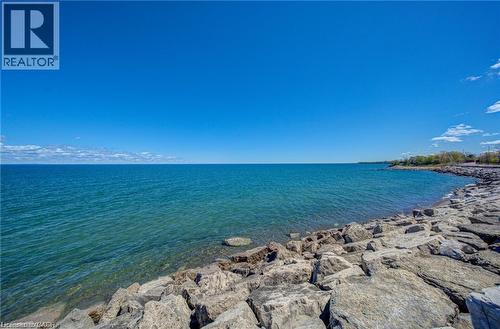 Expansive waterfront with a rocky shoreline - 40 Esplanade Lane Unit# 614, Grimsby, ON 