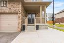 Brick facade with light-colored siding accents - 417 Rivertrail Avenue, Kitchener, ON 