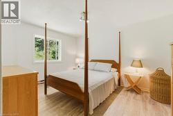 Neutral wall color with wood-finish flooring - 
