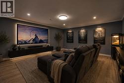 Virtually staged bonus room as theatre room. - 