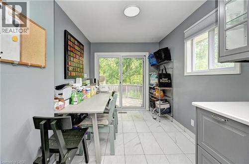 Interior space featuring light gray walls and white tile flooring - 525 Fallingbrook Drive, Waterloo, ON 