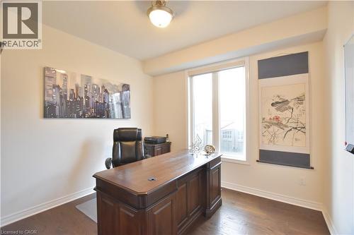 Office with dark wood-style flooring and baseboards - 512 Terrington Crescent, Kitchener, ON 