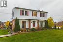 Traditional two-story residence featuring a brick and siding exterior - 70 Webster Road, Hamilton, ON 