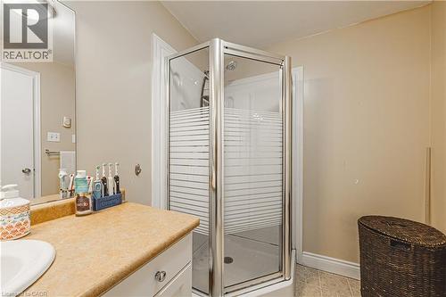 Corner glass shower enclosure with frosted privacy banding - 70 Webster Road, Hamilton, ON 