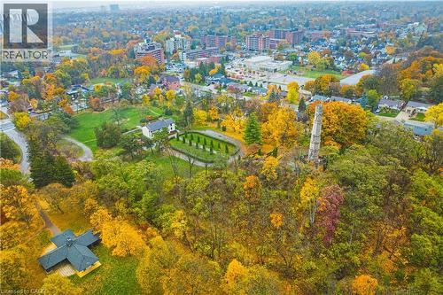 Expansive green spaces featuring mature trees and a curving pathway - 70 Webster Road, Hamilton, ON 