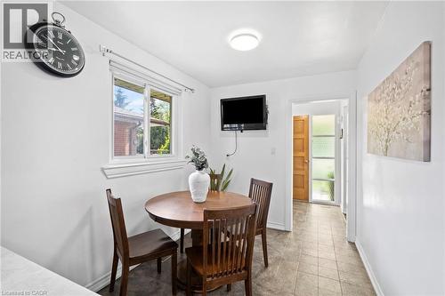 Bright interior space featuring a window with exterior views, white walls, and neutral-toned floor tiling - 1083 Melton Drive, Mississauga, ON 
